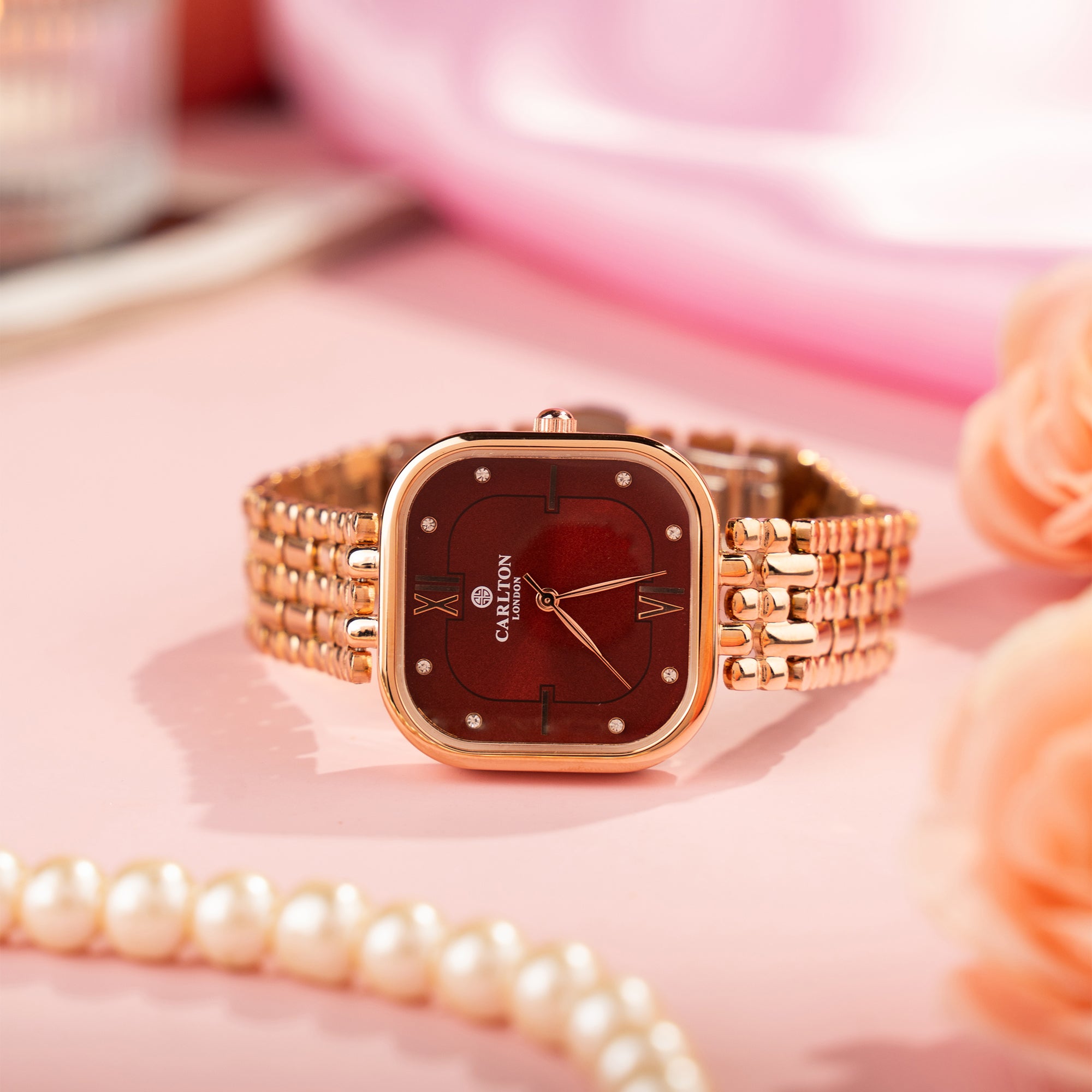 Chelsea: Women Gold / Red Stainless Steel Analog Watch.